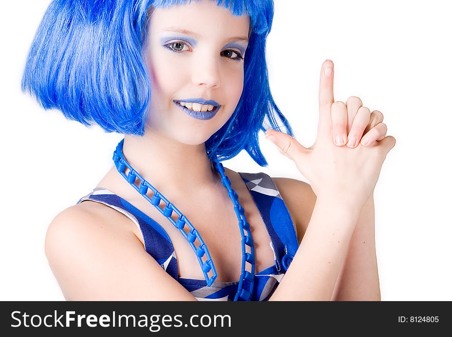 Young enthusiastic child with a blue wig shot on a white background. Young enthusiastic child with a blue wig shot on a white background