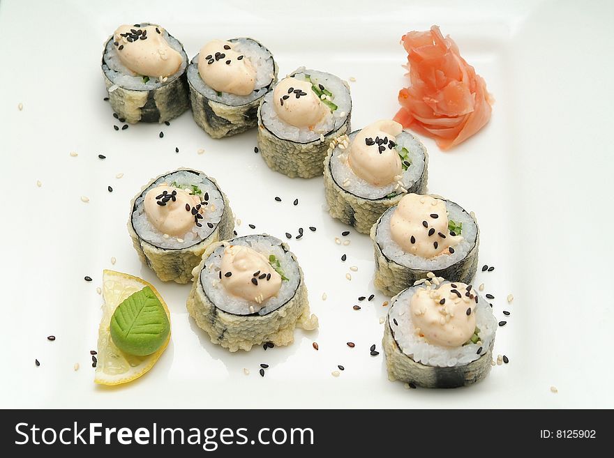 Traditional the Japanese meal sushi on a white background