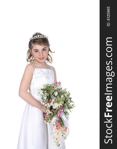 Pretty little girl in white gown, tiara, and holding a bouquet of flowers. Pretty little girl in white gown, tiara, and holding a bouquet of flowers