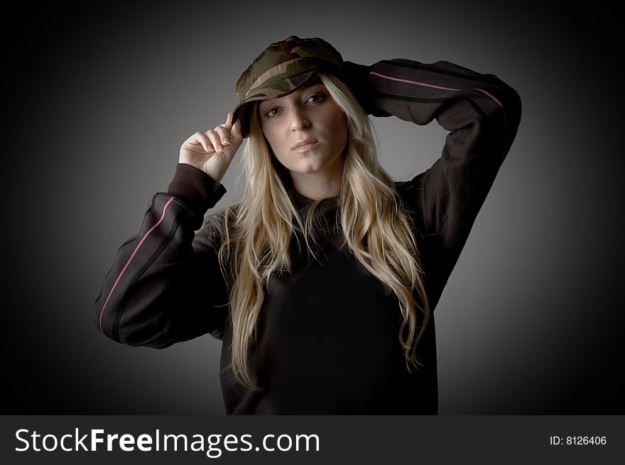 Side view of beautiful woman looking at camera on an isolated white background