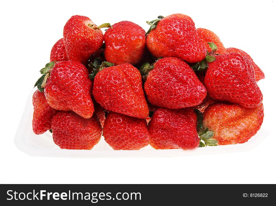 A box holds the fresh strawberries on white background.