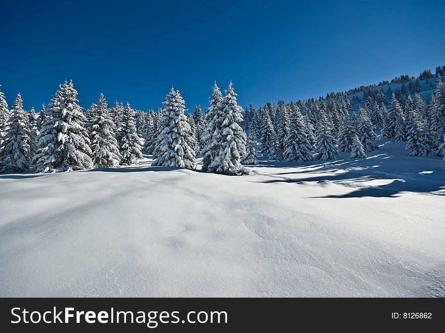 the white summits on the belledonne mountain in french alps. the white summits on the belledonne mountain in french alps