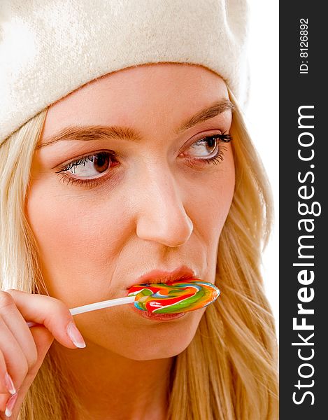 Side view of beautiful woman looking at camera on an isolated white background