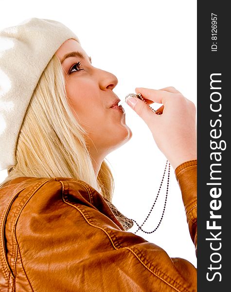 Side view of beautiful woman looking at camera on an isolated white background