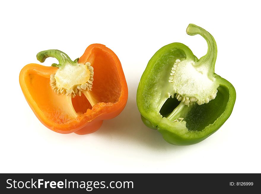 Capsicum pepper pieces on white background. Capsicum pepper pieces on white background