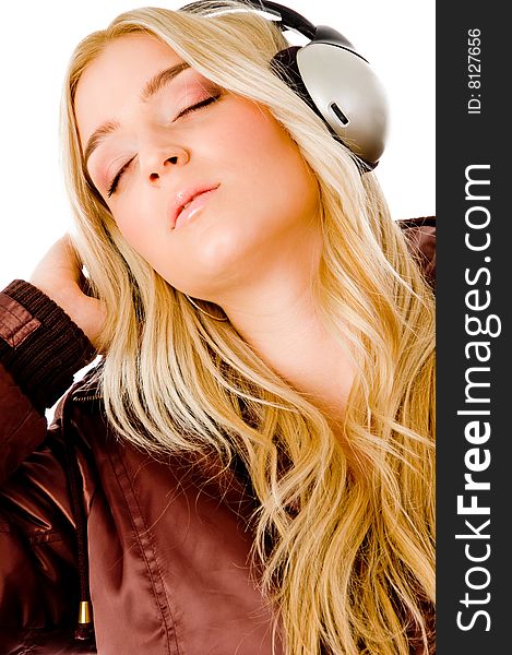 Side view of beautiful woman looking at camera on an isolated white background