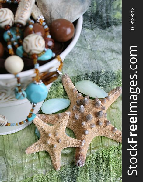 Bucket filled with sweets beading. FOCUS ON SEA STARS. Bucket filled with sweets beading. FOCUS ON SEA STARS