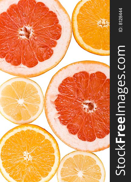 Slices of an lemon, orange and grapefruit background