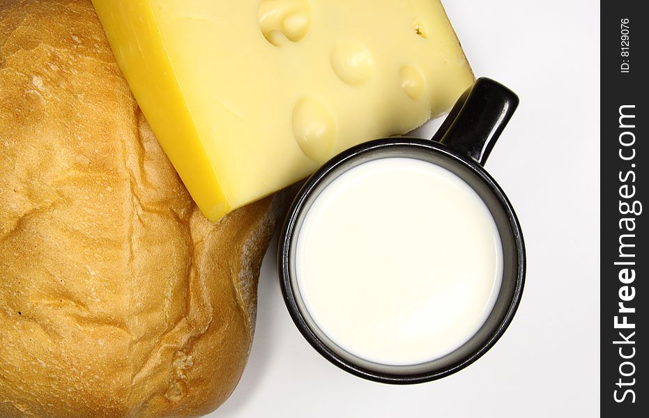 This photo about cup of milk, cheese and bread. This photo about cup of milk, cheese and bread