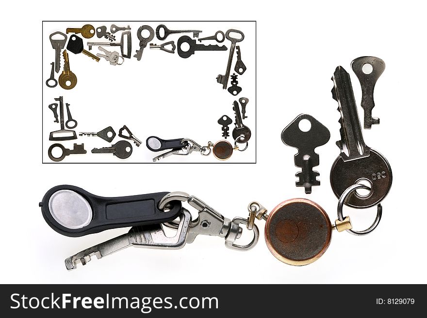 The frame is made of old and new various keys on a white background