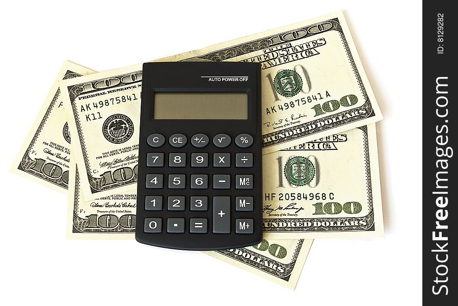 Calculator and dollars isolated on white background. Calculator and dollars isolated on white background