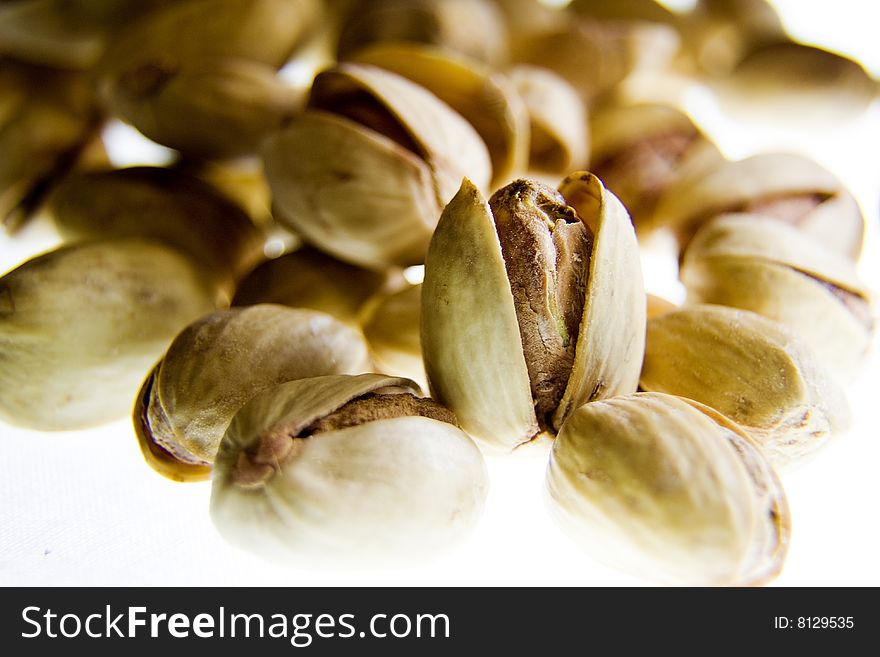 Group of Iranian pistachios in white background