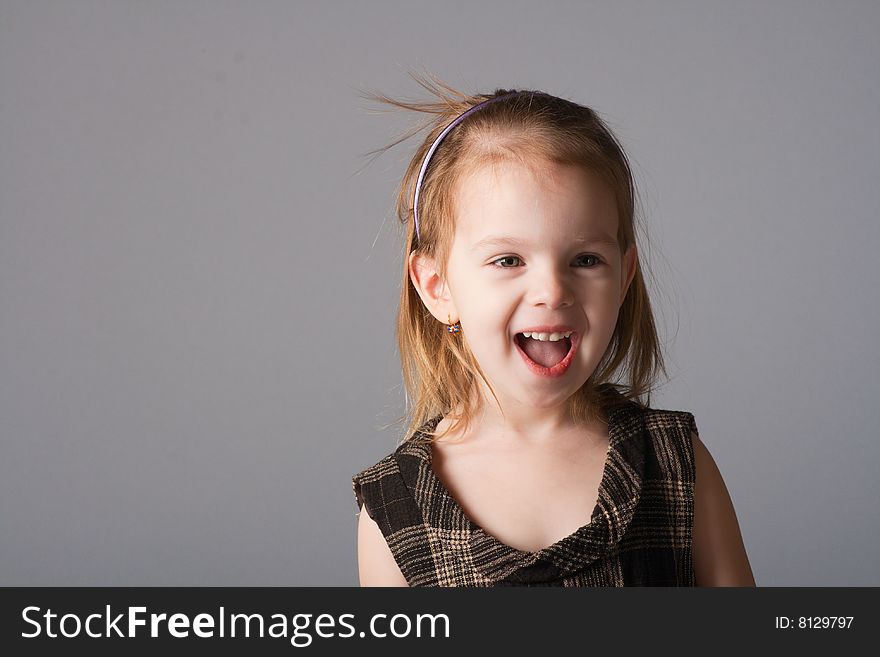 Amazing little beauty red-haired girl laugh and cry. Amazing little beauty red-haired girl laugh and cry.