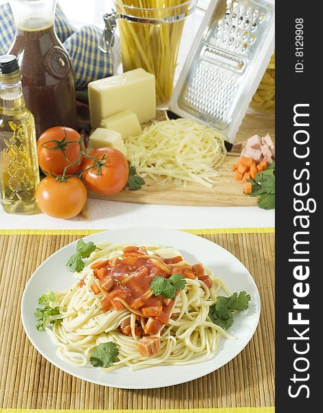 Overhead shot of freshly cooked spaghetti in a big white plate. Overhead shot of freshly cooked spaghetti in a big white plate