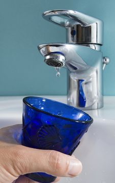Drop Of Water Coming Out Of Tap Royalty Free Stock Photography Drop Of Water Coming Out Of Tap Royalty Free Stock Photography