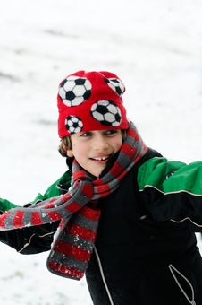 Boy Throwing Snowball Stock Photo Boy Throwing Snowball Stock Photo