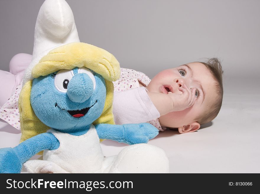 A baby with smurfin in front of it