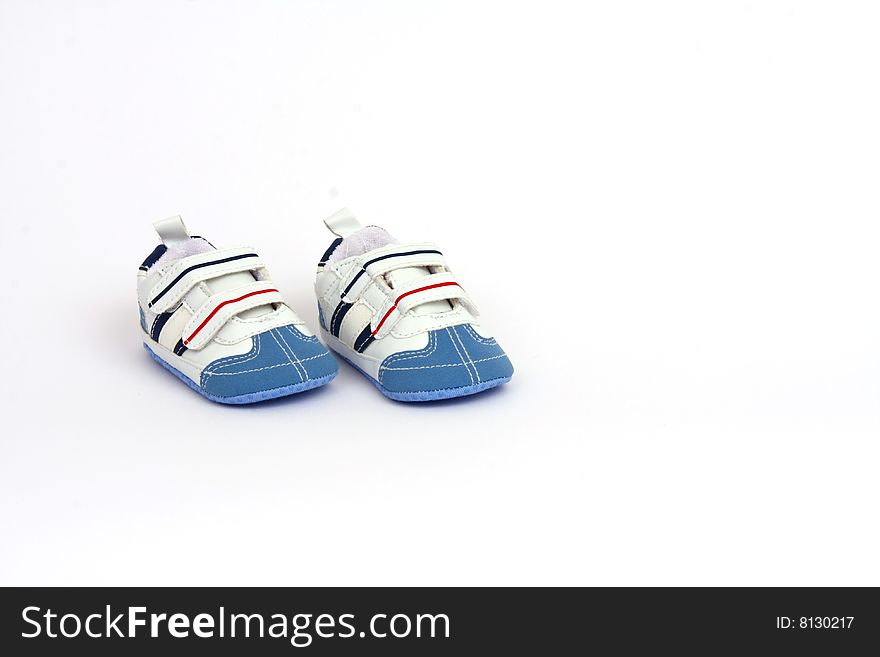 Very small newborn baby shoes isolated. Very small newborn baby shoes isolated