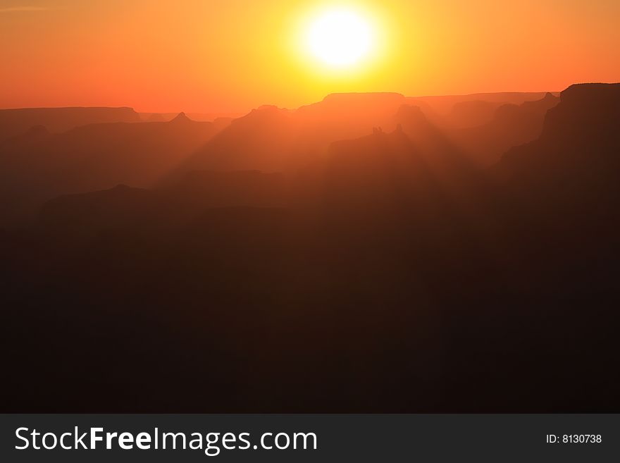 The sun setting over the Grand Canyon National Park, Arizona. The sun setting over the Grand Canyon National Park, Arizona.