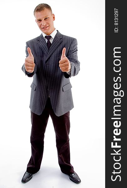 Standing businessman with thumbs up on an isolated white background