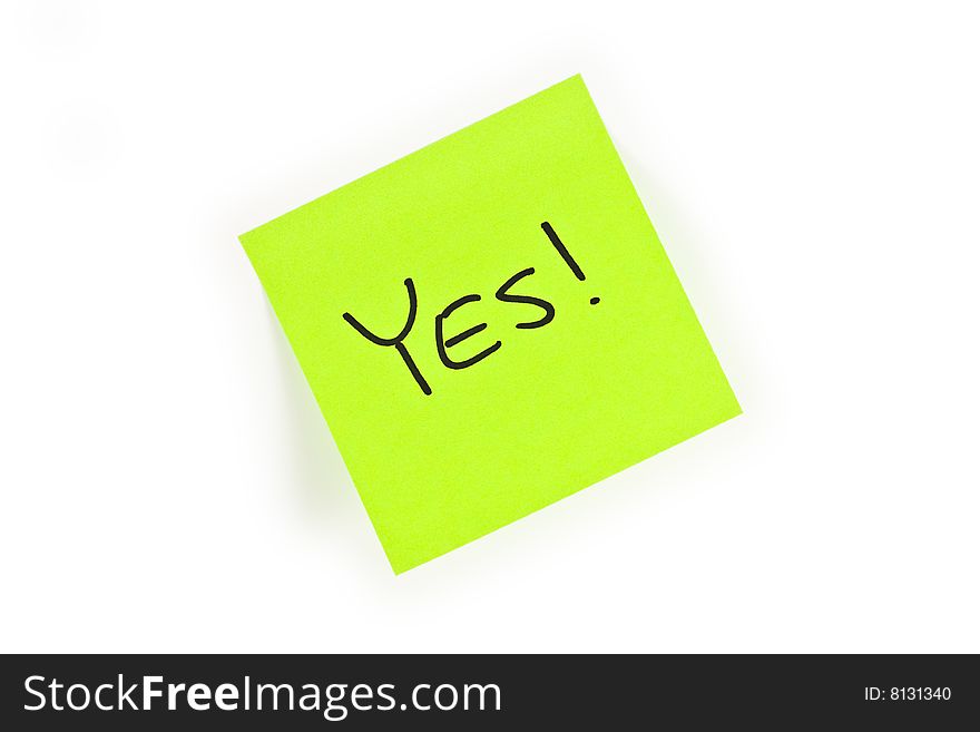 Post-it with the word YES! written on it isolated on white. Post-it with the word YES! written on it isolated on white