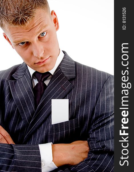 Businessman with folded hands and looking at camera on an isolated white background