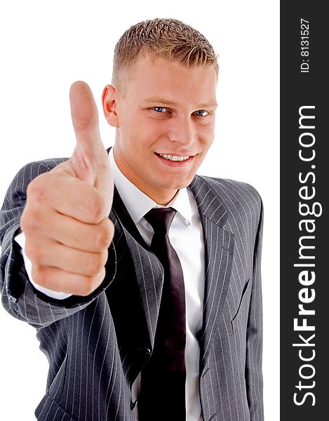 Young businessman with thumbs up on an isolated white background