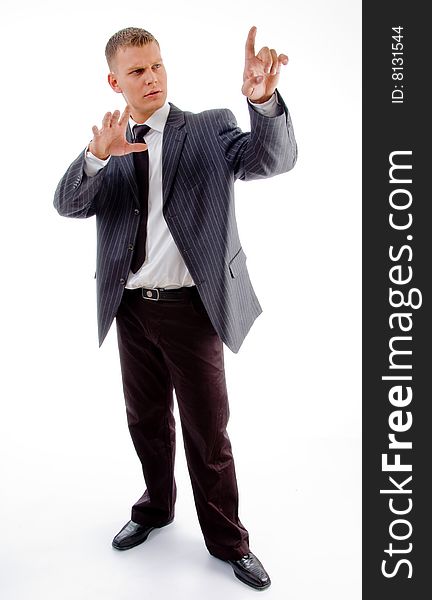 Businessman looking his index finger