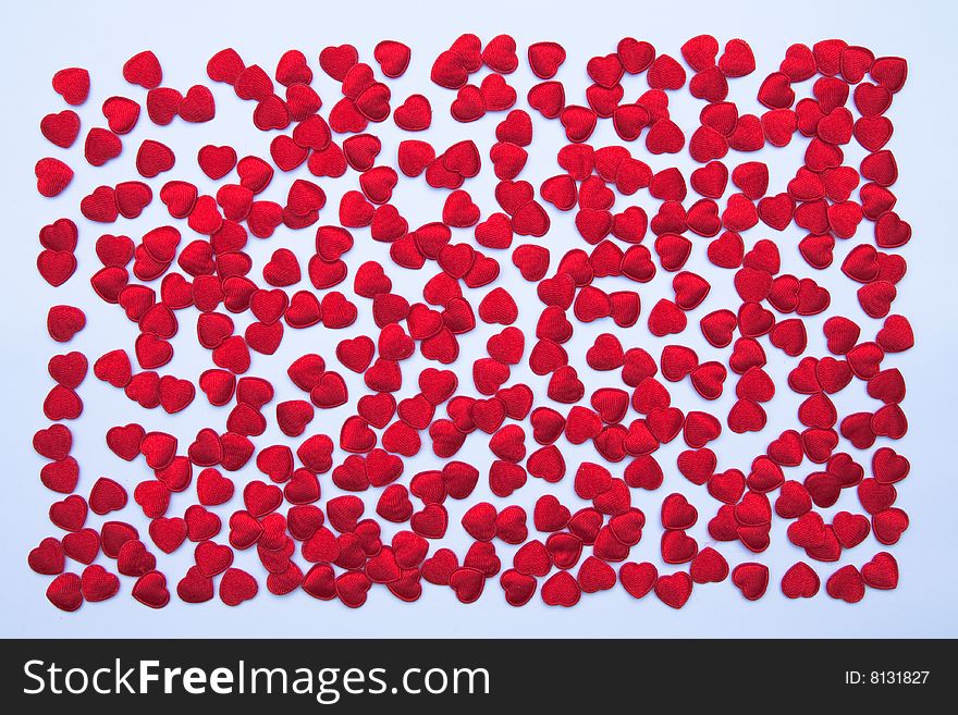Small red hearts made from cloth. Small red hearts made from cloth.