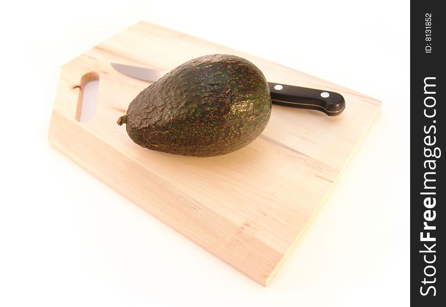 Avocado On Cutting Board
