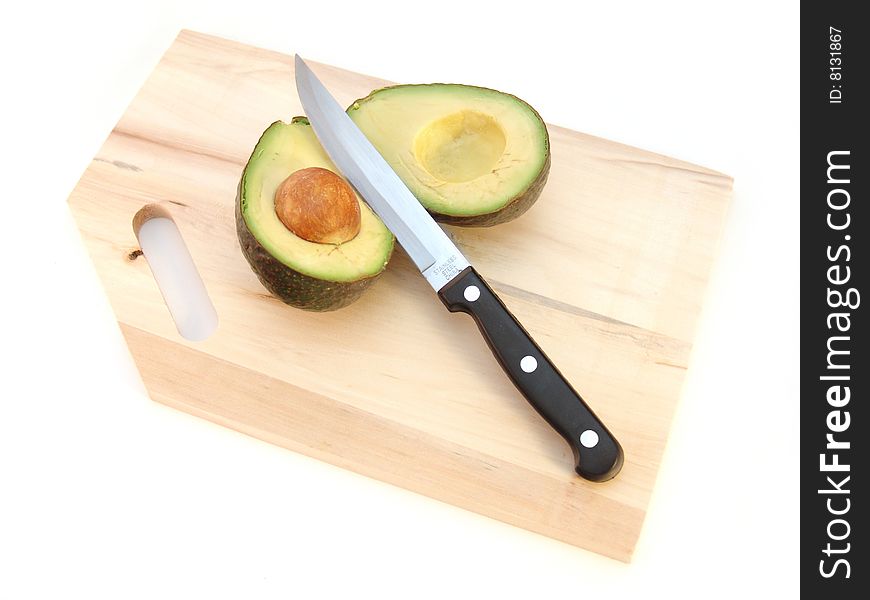 Avocado With Pit And Knife