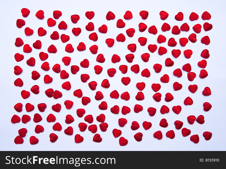 Small red hearts made from cloth. Small red hearts made from cloth.