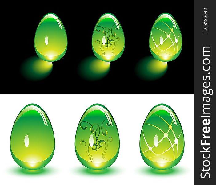 Green Easter glass eggs glowing in the dark and isolated. Green Easter glass eggs glowing in the dark and isolated.