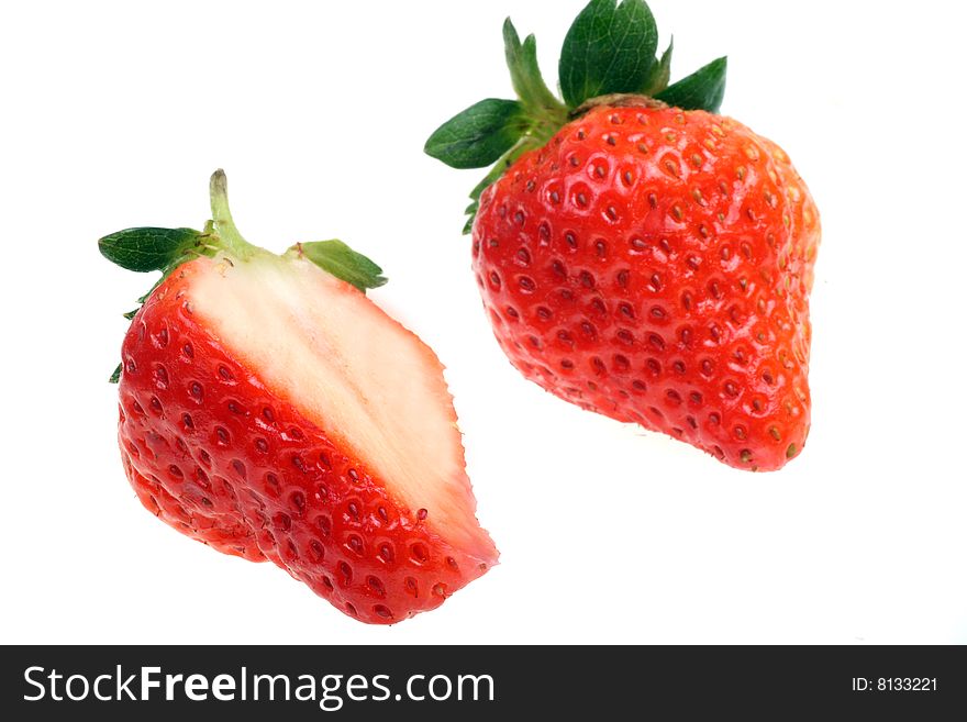 Fresh ripe strawberries on white background.