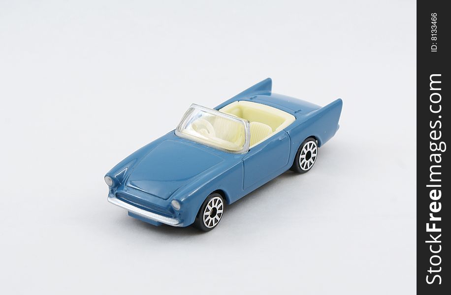 Car scale toy model of Sunbeam Alpine 5 in blue color, James Bond 007 car (Shell collection). Car scale toy model of Sunbeam Alpine 5 in blue color, James Bond 007 car (Shell collection)