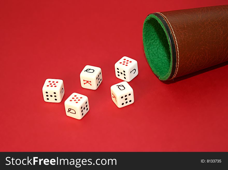 Poker dice in red game table