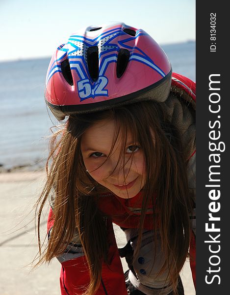Young girl rollerblading
