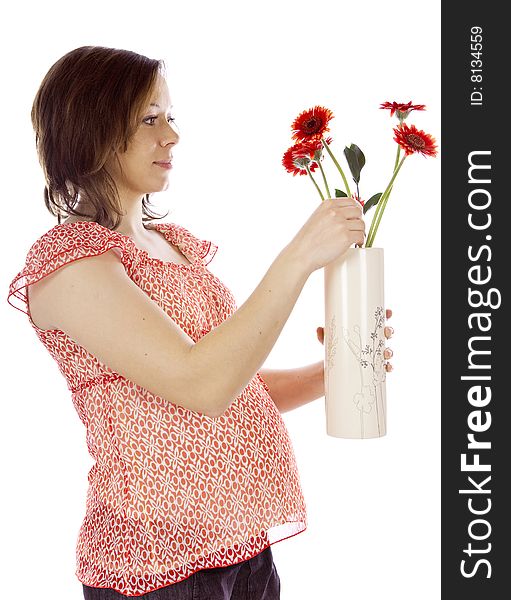 Studio photo of beauty pregnant woman with flower