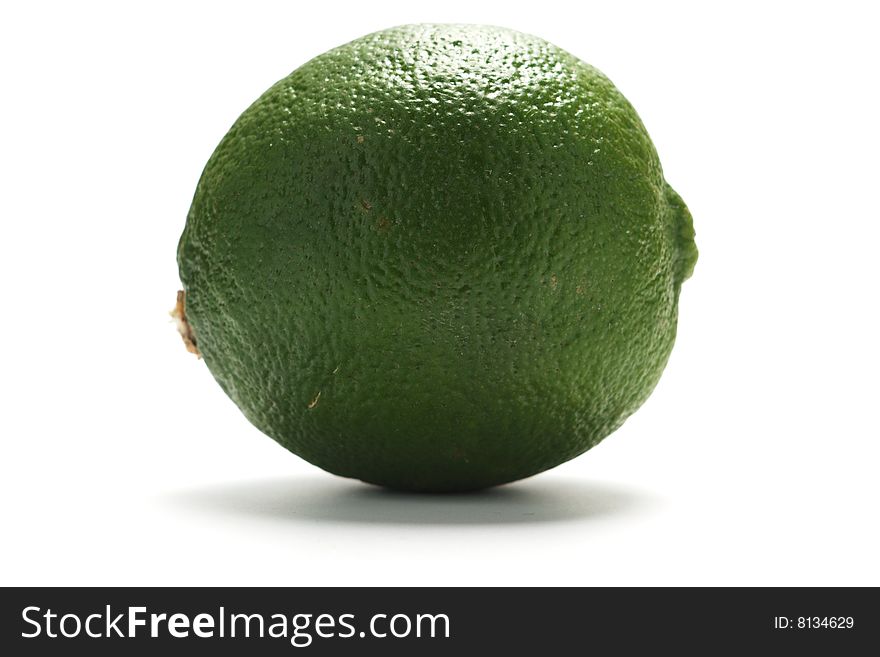 Green lime isolated on a white background.