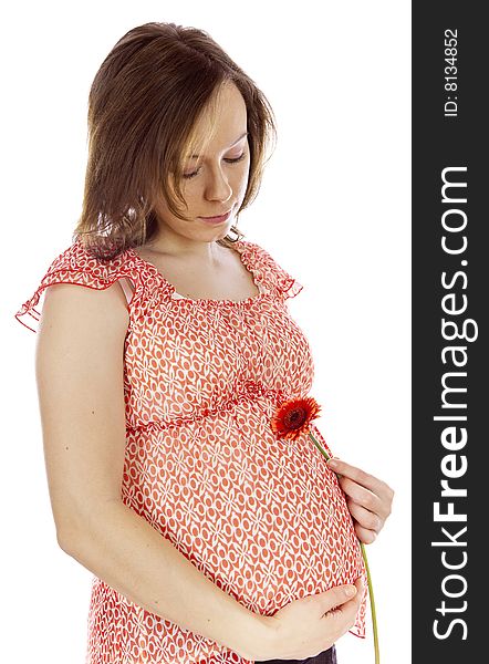 Studio photo of beauty pregnant woman with flower