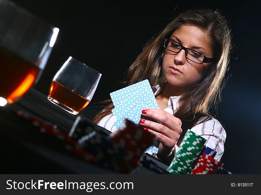 Beautiful woman who playing poker