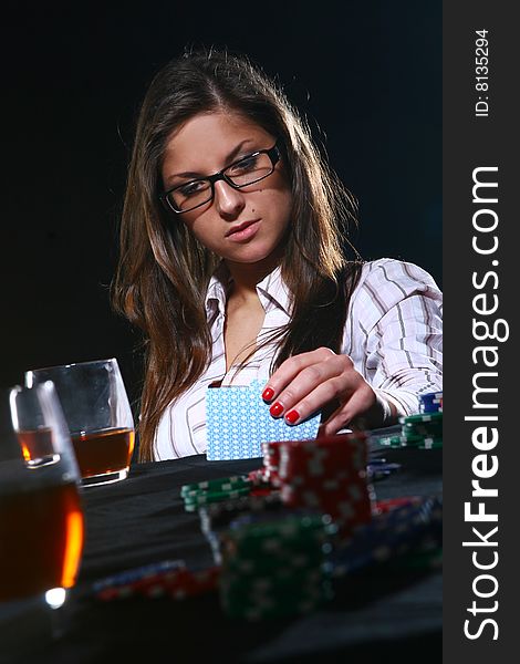 Beautiful woman who playing poker