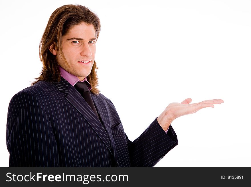 Side view of standing successful businessman with white background
