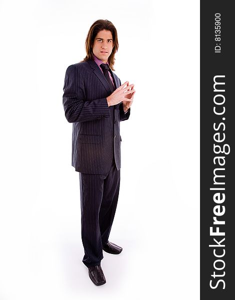 Side view of standing successful businessman with white background