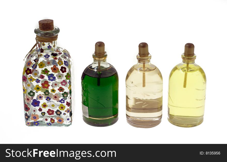 Multi-coloured bottles with oil  and sphere