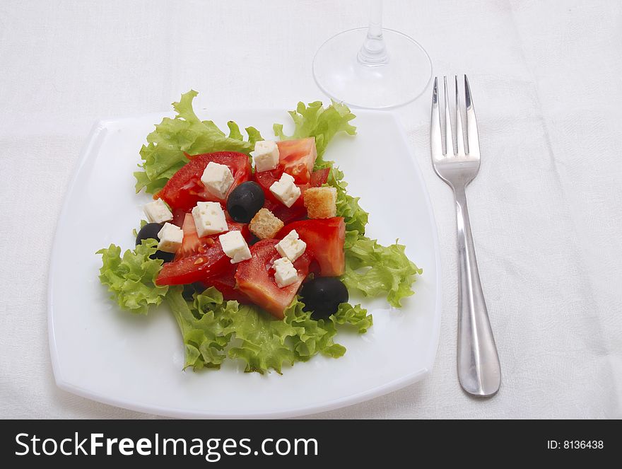 Dieting  salad with tomato, cheese, olive