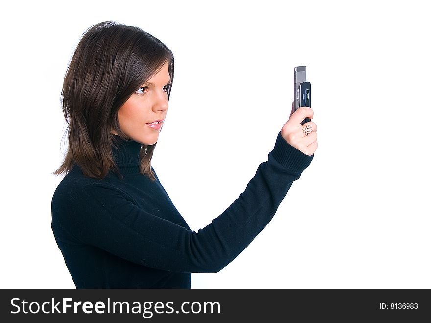 The girl photographing on phone. The girl photographing on phone