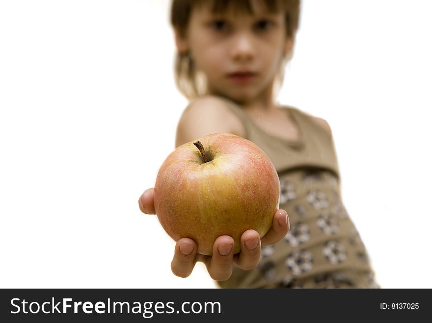 Young boy with red and yellow apple in hand. Young boy with red and yellow apple in hand