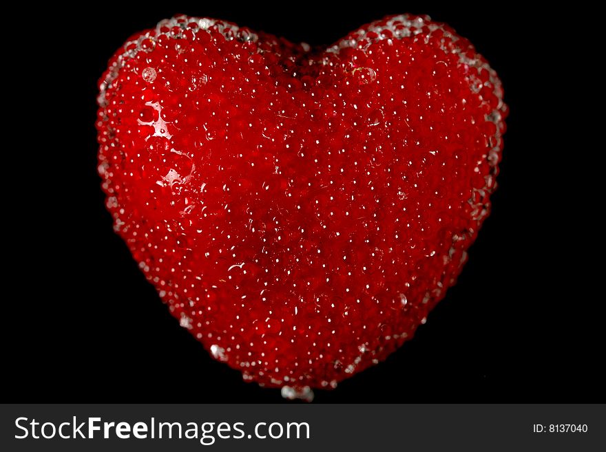 Red heart on black background