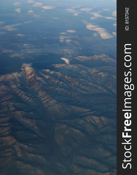 A aerial view of mountains over Siberia in winter. A aerial view of mountains over Siberia in winter